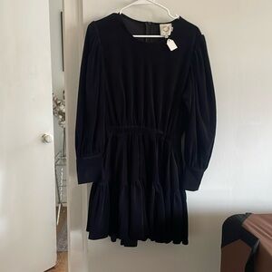Looks like a dress but is actually a velvet very rich material romper!